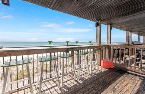 Watch the sunset while sipping a cocktail on your own private balcony bar. 