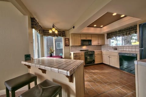 Fully Equipped Kitchen with Counter Seating
