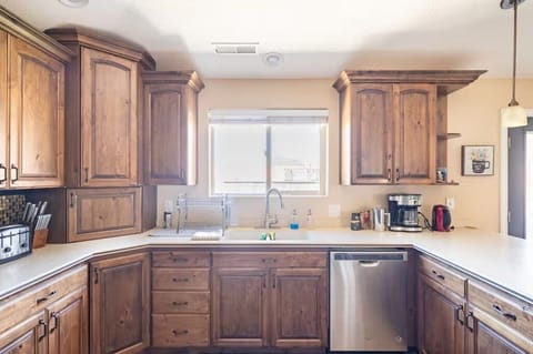 Kitchen with stainless steel appliances and views