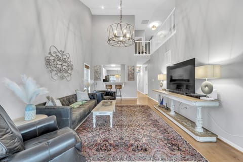 Enjoy the large-screen TV with cable service and streaming capabilities.