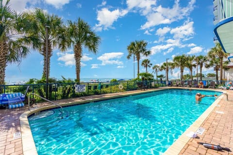 Oceanfront outdoor pool with panoramic coastal views