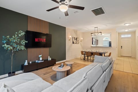 Comfortable living area with dining space for family and friends