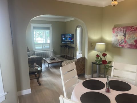 Deluxe House, Patio | Living area | Flat-screen TV