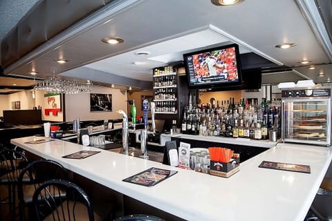 Unwind with a nightcap at the welcoming on-site bar.