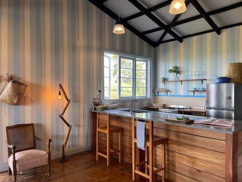 Kitchen space, large stone bench for your culinary creations.