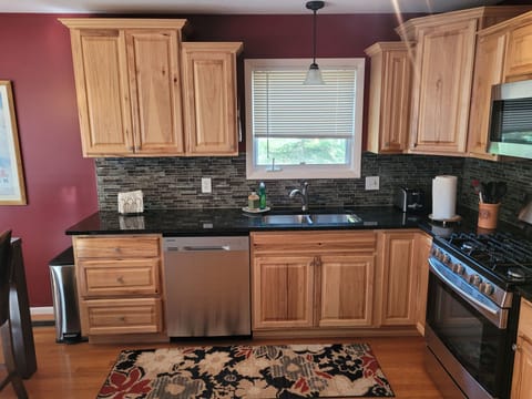 KITCHEN:  The home has a very modern kitchen with all appliances including a dishwasher.