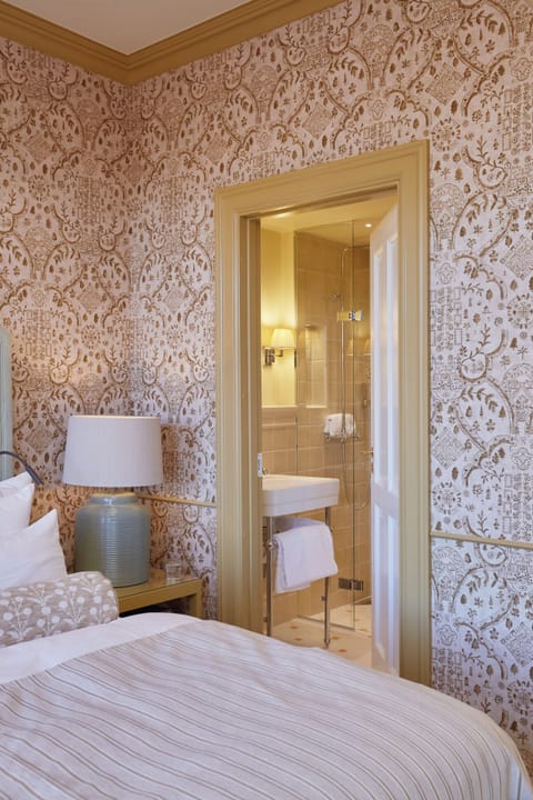 Premium bedding, down comforters, pillowtop beds, minibar