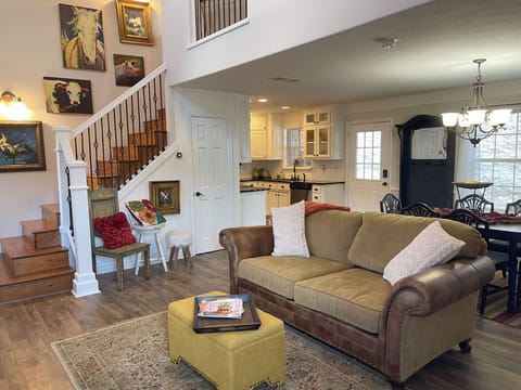 The main living area leading up to the 2 bedrooms, bathroom, and office nook
