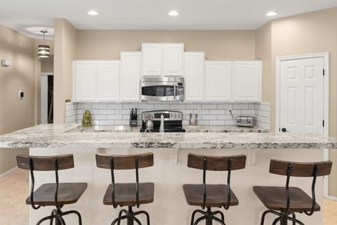 There is bar seating for 4