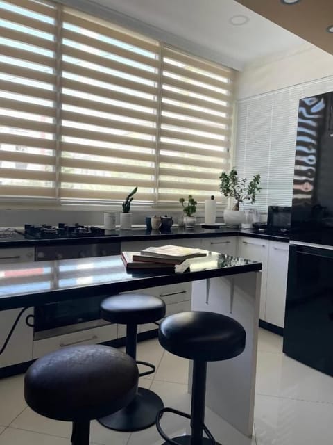 Apartment, Balcony, City View | Private kitchen | Toaster