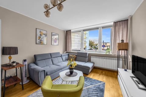 Living Room with Sofa Bed, Smart TV and Dining Table | Book Now with RENTUJEMY.COM
