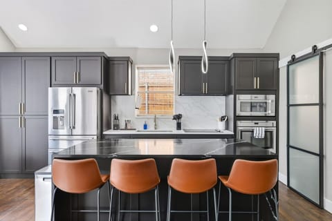 Grab a front-row seat on one of these kitchen barstools to watch the magic of the kitchen unfold! This fully equipped kitchen has everything you need to whip up family favorites and Southern classics!