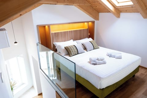 Luxury Suite, Balcony, City View | In-room safe, blackout drapes, soundproofing, free WiFi