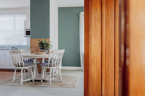 A quiet corner for morning coffee or evening wine - always bathed in gentle light.