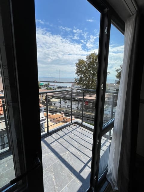 Deluxe Condo, Balcony, Sea View | In-room safe, blackout drapes, soundproofing, iron/ironing board