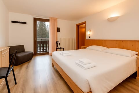 Deluxe Double Room | Premium bedding, down comforters, in-room safe, iron/ironing board