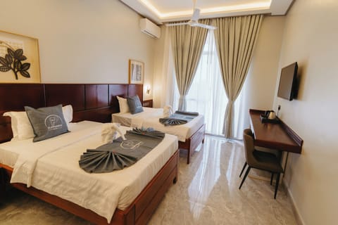 Twin Room, Balcony, City View | In-room safe, desk, laptop workspace, blackout drapes