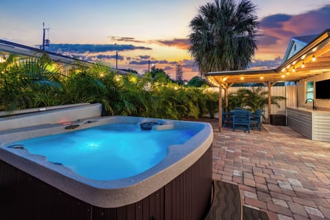 Evening magic awaits—soak in the warm bubbles under the glow of twilight skies.