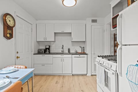 Kitchen with stove, coffee maker, toaster