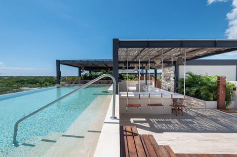 Outdoor pool, pool umbrellas, sun loungers