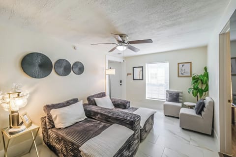 2 can sleep in this living space, featuring a convertible sofa, 