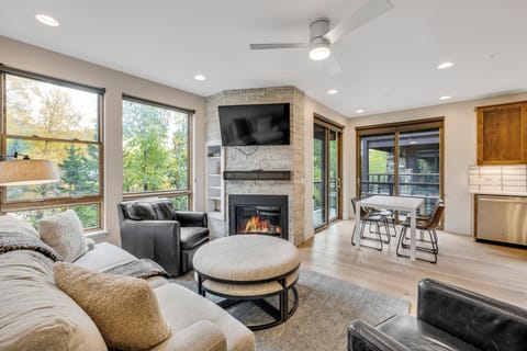 Cozy Living Room with fireplace and Flat Screen TV