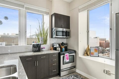 CIty views and natural light from tall windows.