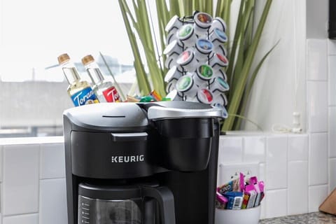 Combination drip or cup coffee maker.