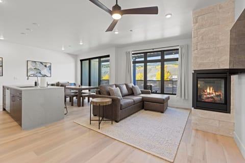 Living area with smart TV and gas fireplace.