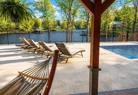 Relax in the pool overlooking the water with stunning sunrise and sunset views!