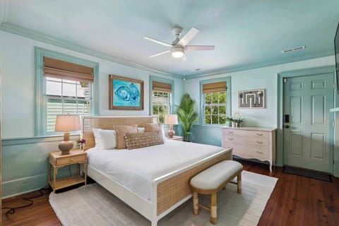 Bedroom #2: Designed with a king bed, Smart TV, beautiful natural light, and a stylish vanity that doubles as a workspace.