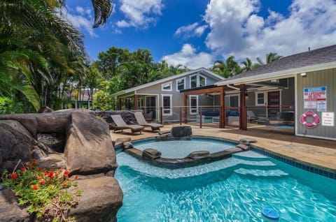 Lani Oasis welcomes you with a private saltwater pool framed by lava rock accents and tropical gardens, perfect for sunny afternoons in Princeville.