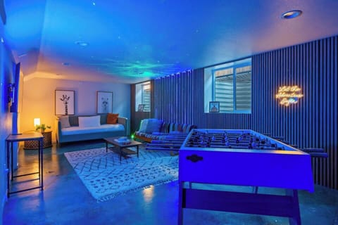 Bring the fun downstairs with neon-lit game room, foosball, air hockey & more!