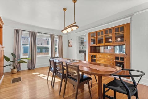 Airy dine space filled with natural light perfect for family meals or gatherings