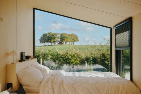 Raus | Cabins in the Countryside | Laptop workspace, blackout drapes, free WiFi