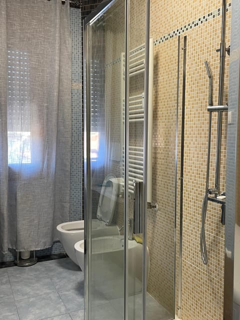 Shower, towels, soap, shampoo