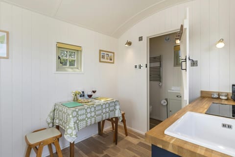dining table and two stools