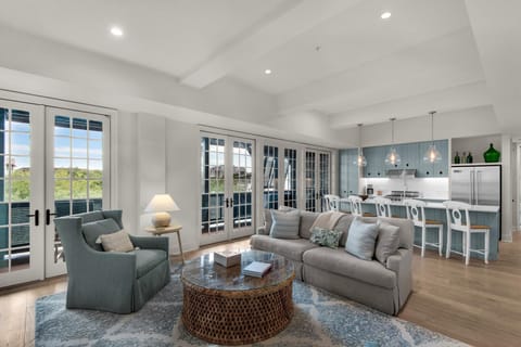 Sunlit living room with cozy seating