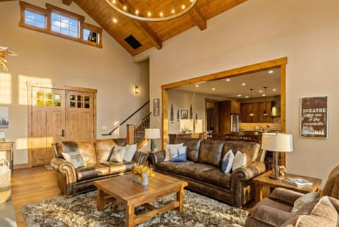 View of living room, dining and kitchen area from a different perspective.