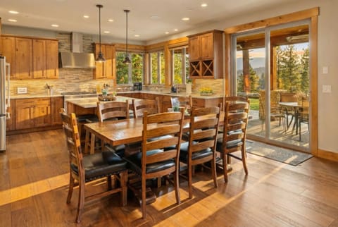 Dining table with seating for 8. Large kitchen island seats another 4. 