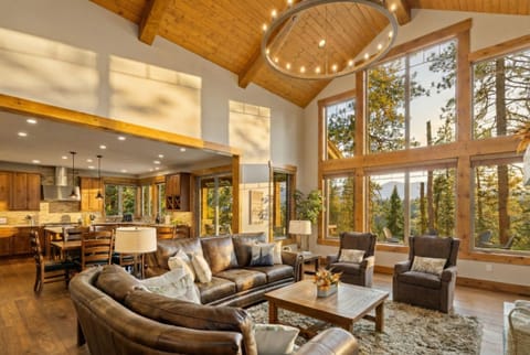 Open and inviting living room, connected to the dining and kitchen area. 