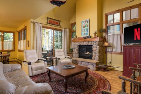 Cozy living room with fireplace and smart TV