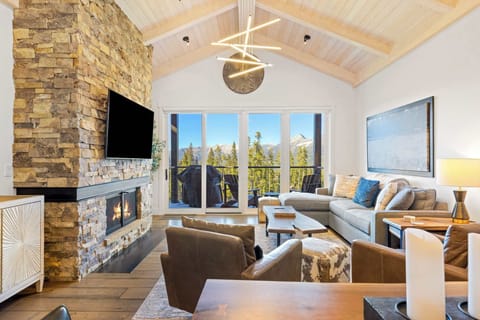 Living room: Gas fireplace, Smart TV, mountain views, access to patio