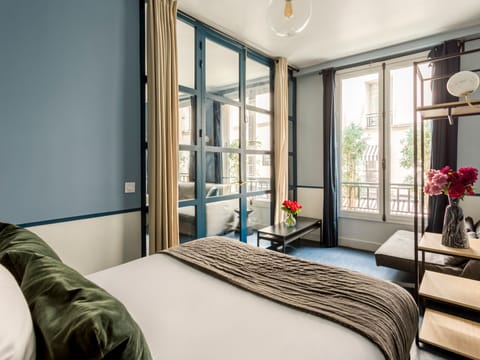 Apartment, City View | Hypo-allergenic bedding, pillowtop beds, in-room safe