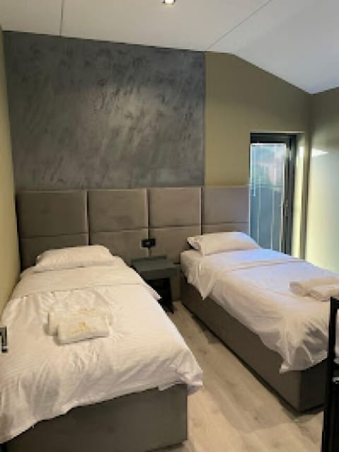 Twin Room, Balcony, Mountain View | In-room safe, laptop workspace, soundproofing, iron/ironing board