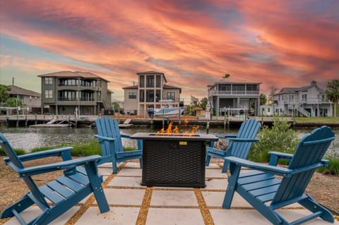 Waterfront Fire Pit & Adirondack Chairs