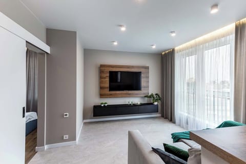 Classic Apartment, City View | Living area | 40-inch LCD TV with digital channels