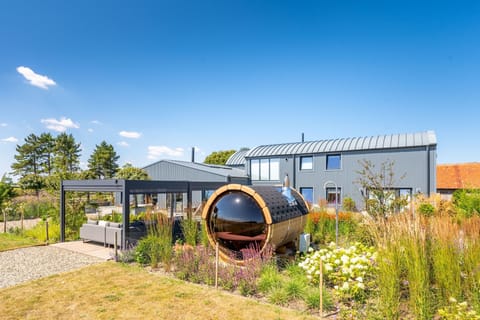 Indigo Barn, Warham near Wells-next-the-Sea: Beautifully presented, both inside and out with covered terrace and the Sauna with views over the fields