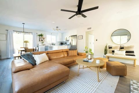 Spend a lazy afternoon on the leather chaise lounge catch up on your favorite shows