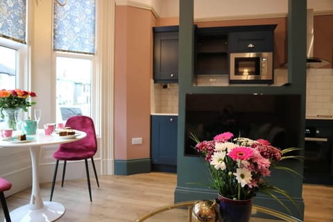 Smart TV in living area as well as the bedroom